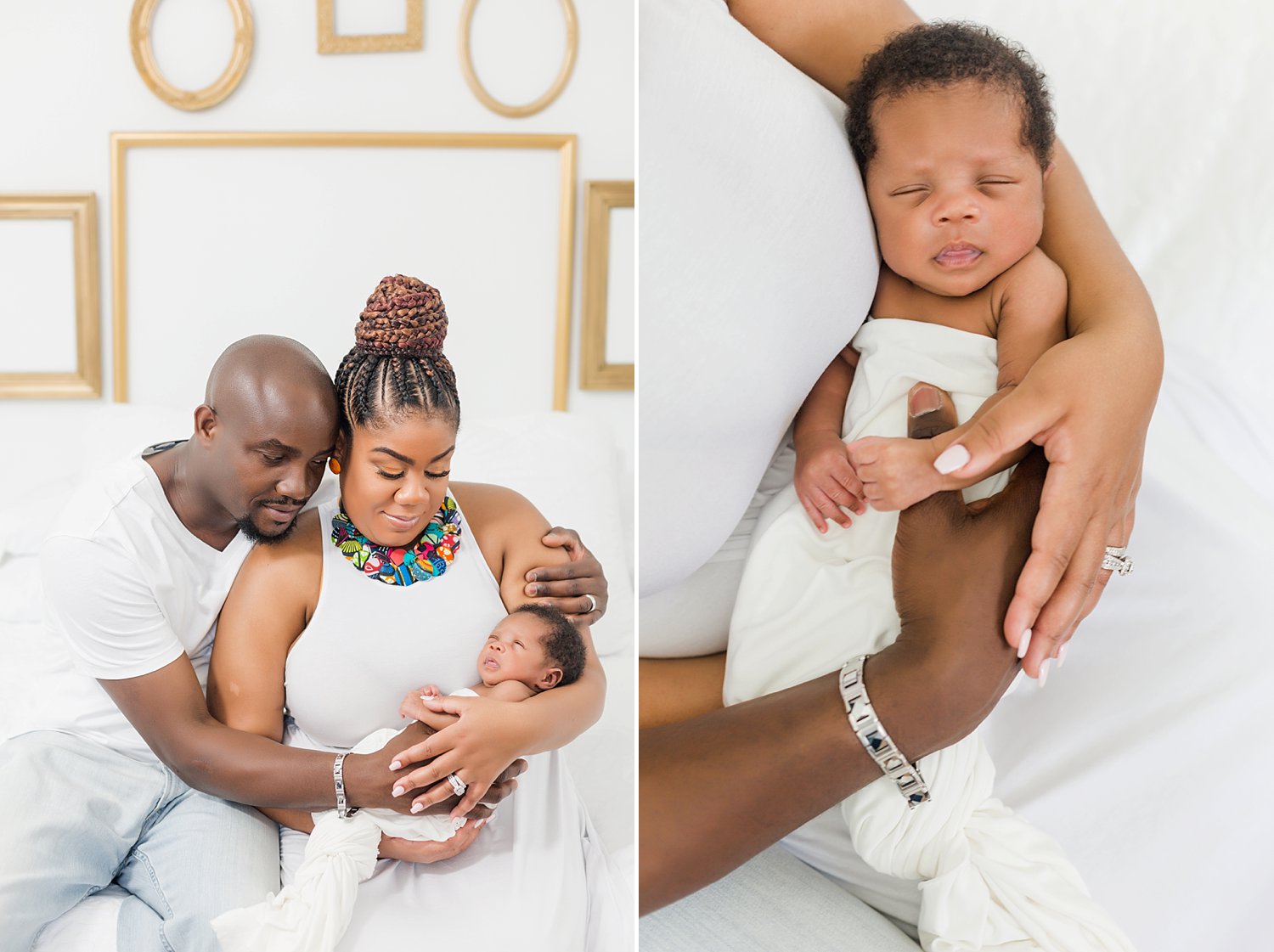 newborn baby boy cuddled in the arms of his parents in a white studio with a gold frame gallery wall